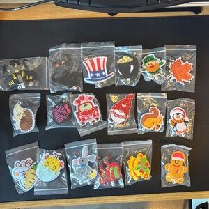 Assorted Expandable Embroidered Felt Holiday Lanyard Clips.